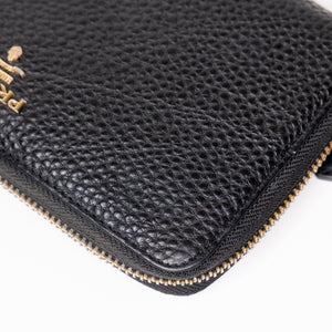 PRADA ZIP AROUND WALLET IN BLACK GHW