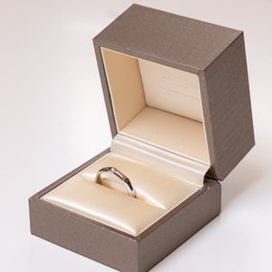 BVLGARI INFINITO WEDDING BAND IN PLATINUM SET WITH ONE DIAMOND