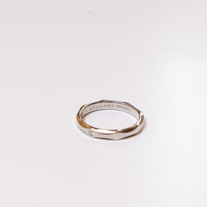 BVLGARI INFINITO WEDDING BAND IN PLATINUM SET WITH ONE DIAMOND