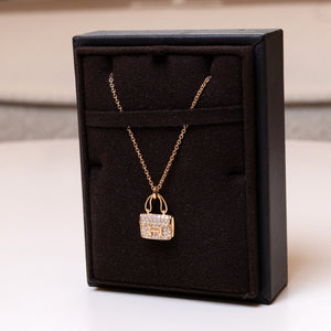 HERMES AMULETTE NECKLACE ROSE GOLD